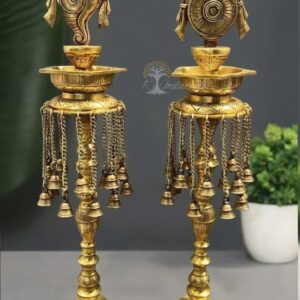 Brass Unique Standing Shankhu Chakra Oil Lamps .