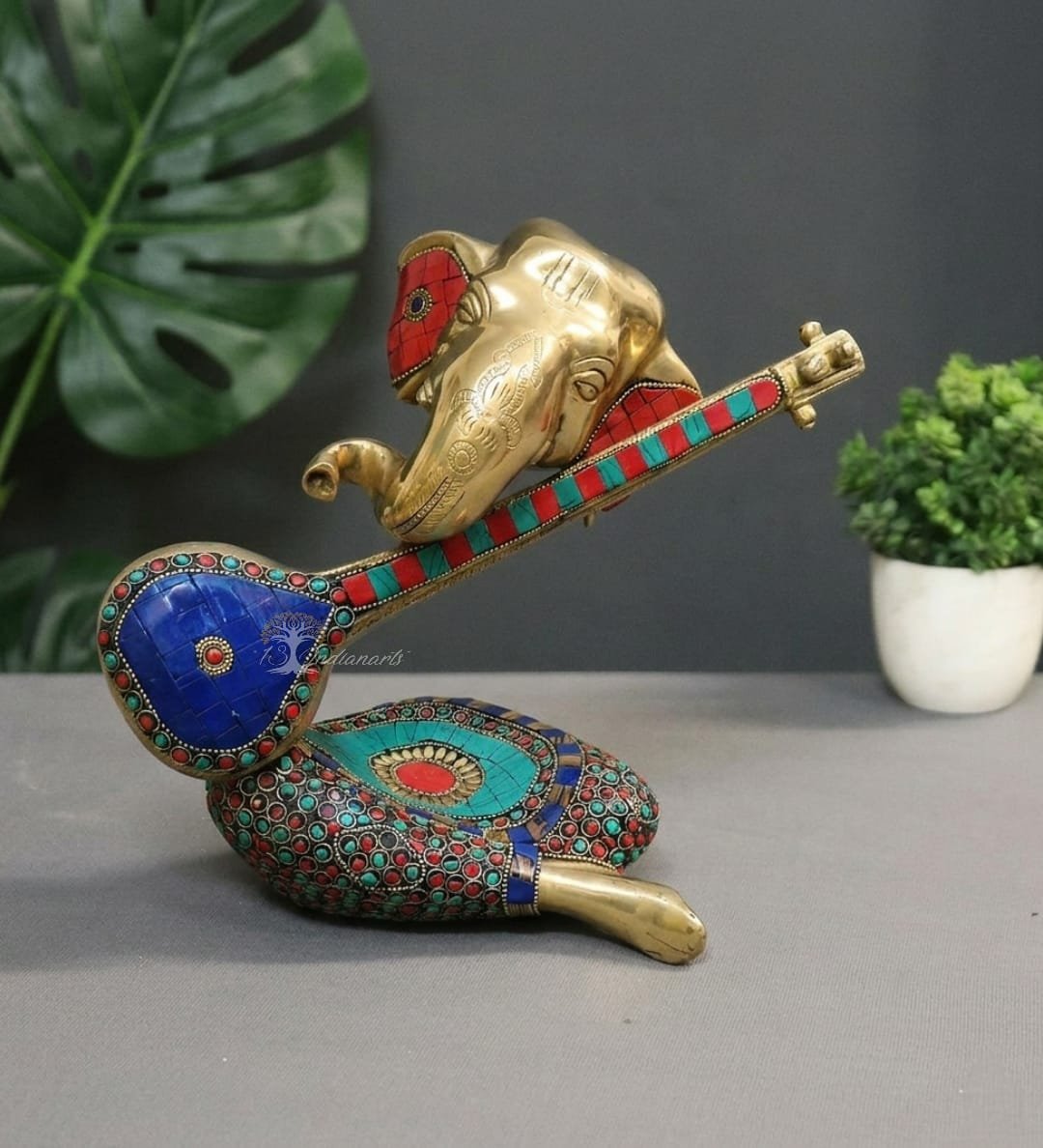 Brass Modern Ganesha Idol With Veena & Stone Work .
